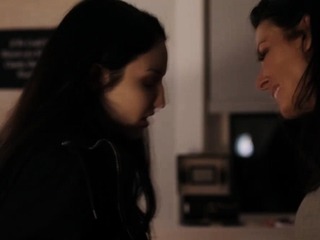 Stepmom comforts her crying stepdaughter